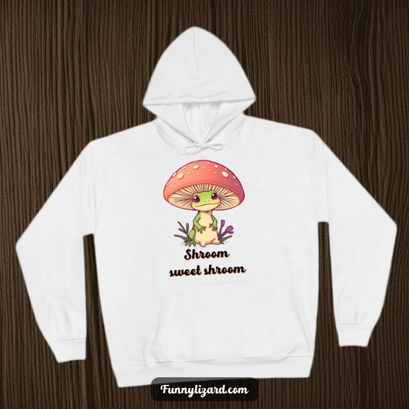 Funny hoodie featuring a curious lizard peeking from behind a giant, colorful mushroom, providing cozy comfort and whimsical humor.